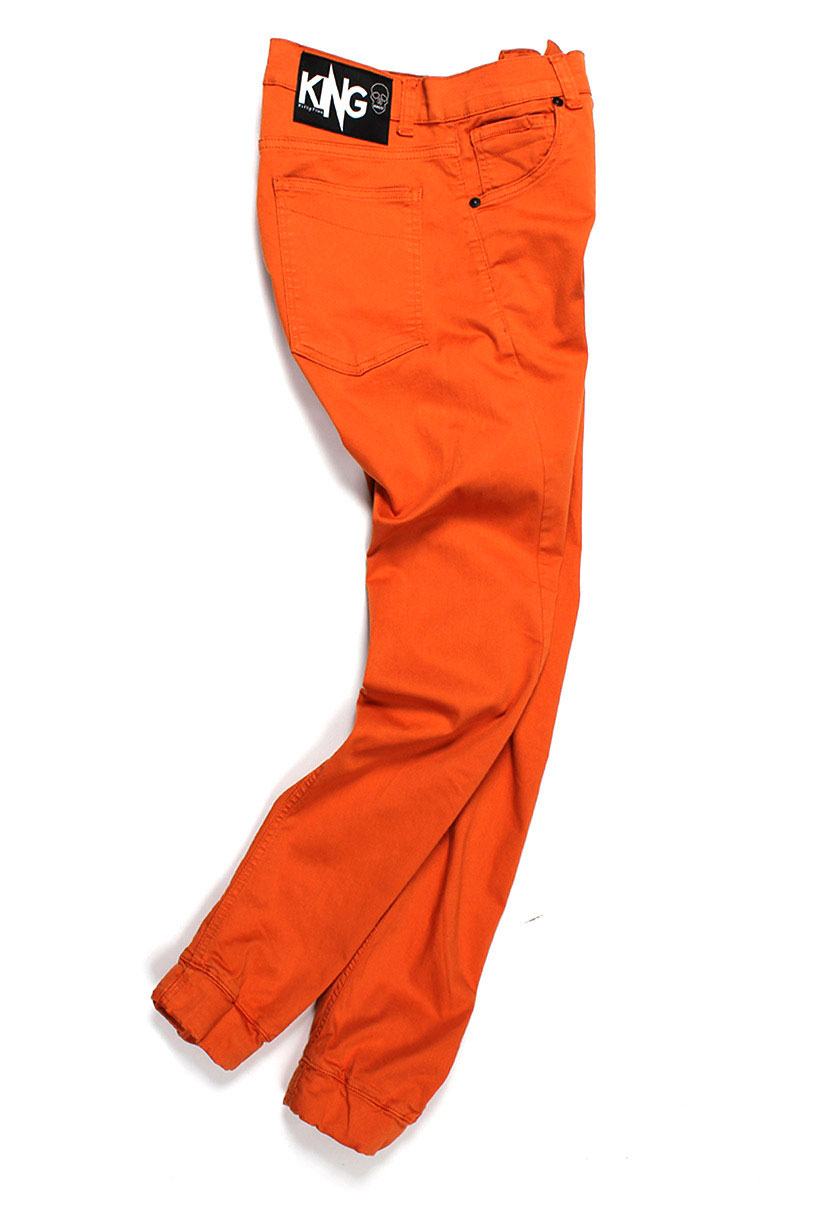 calça laranja masculina